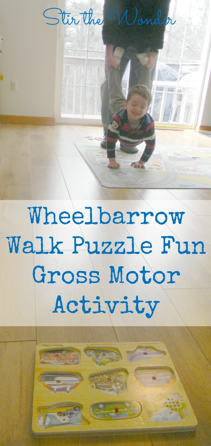 Wheelbarrow Walk Puzzle Fun Gross Motor Activity is a great way to burn some energy indoors and works on corrdination and arm strength! | Gross Motor A to Z Blog series at Stir the Wonder
