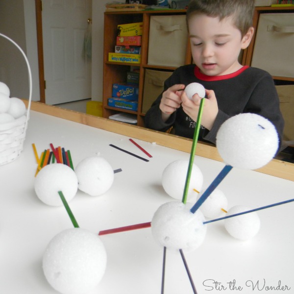 Building sculptures with snowballs and skinny craft sticks