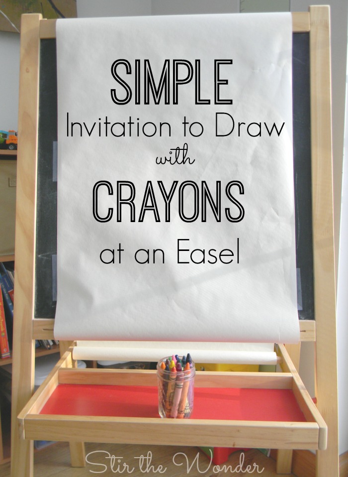 Set up a simple invitation to draw with crayons at an art easel for a fun open-ended process art activity! 