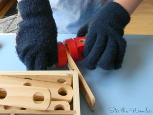 Astronaut Fine Motor Training- building with gloves and construction set